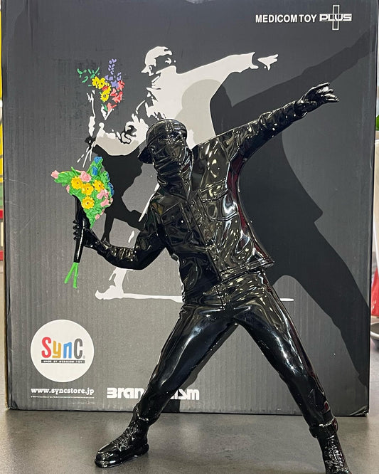 Banksy - Flower Bomber Brandalism